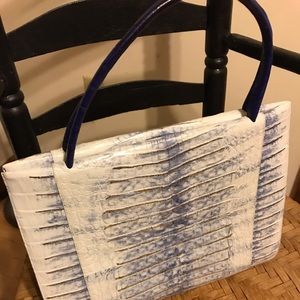 Nancy Gonzalez purse